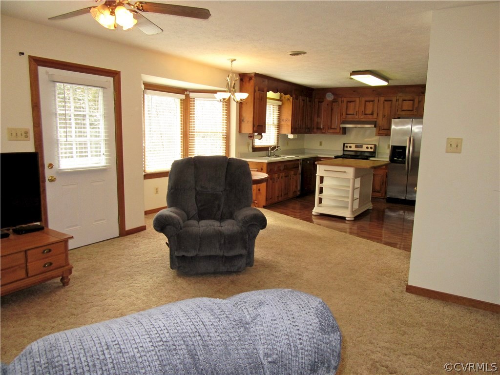 View of the Open Living Room and Eat-in Kitchen! T