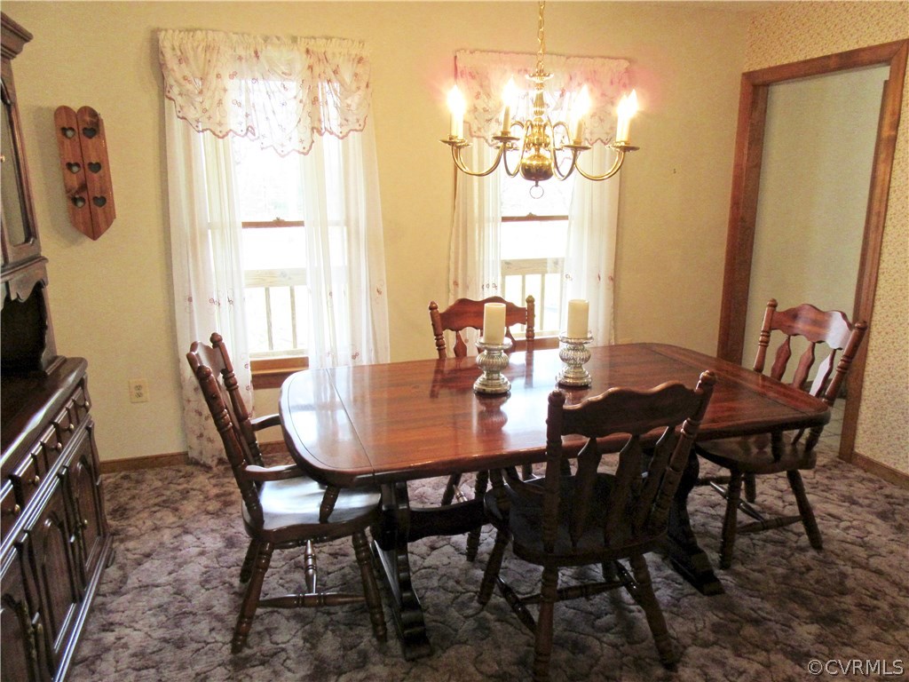 6627 Sycamore Road Quinton, VA 23141 - Photo 9 of 25 The Formal Dining Room has Plush Carpet and 2 Wind