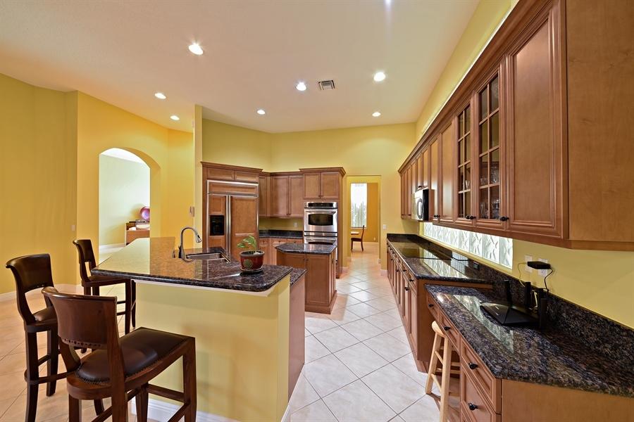 8108 Laurel Ridge Court Delray Beach, FL 33446 - Photo 3 of 16 03_8108LaurelRidgeCourt_5_Kitchen_LowRes