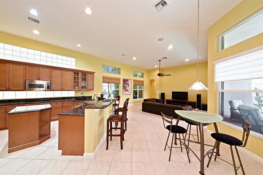 8108 Laurel Ridge Court Delray Beach, FL 33446 - Photo 4 of 16 04_8108LaurelRidgeCourt_191_KitchenBreak