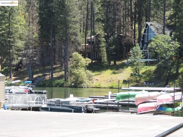a view of a lake with a sitting area