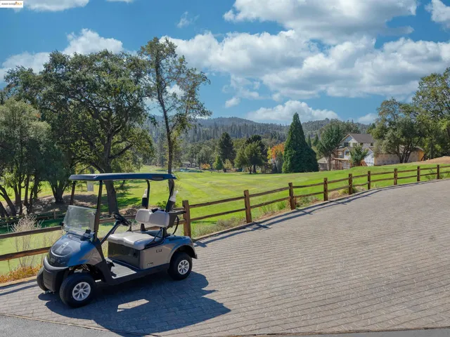 a view of an outdoor space and tennis court