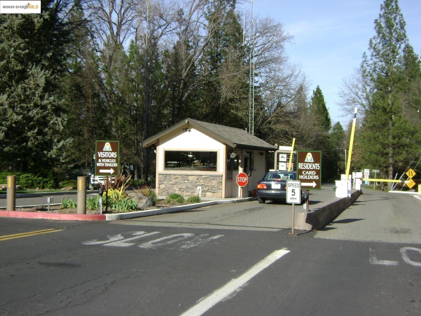 7-62a Ferretti Road Groveland, CA 95321 - Photo 25 of 28 a view of road with card parked on side and road