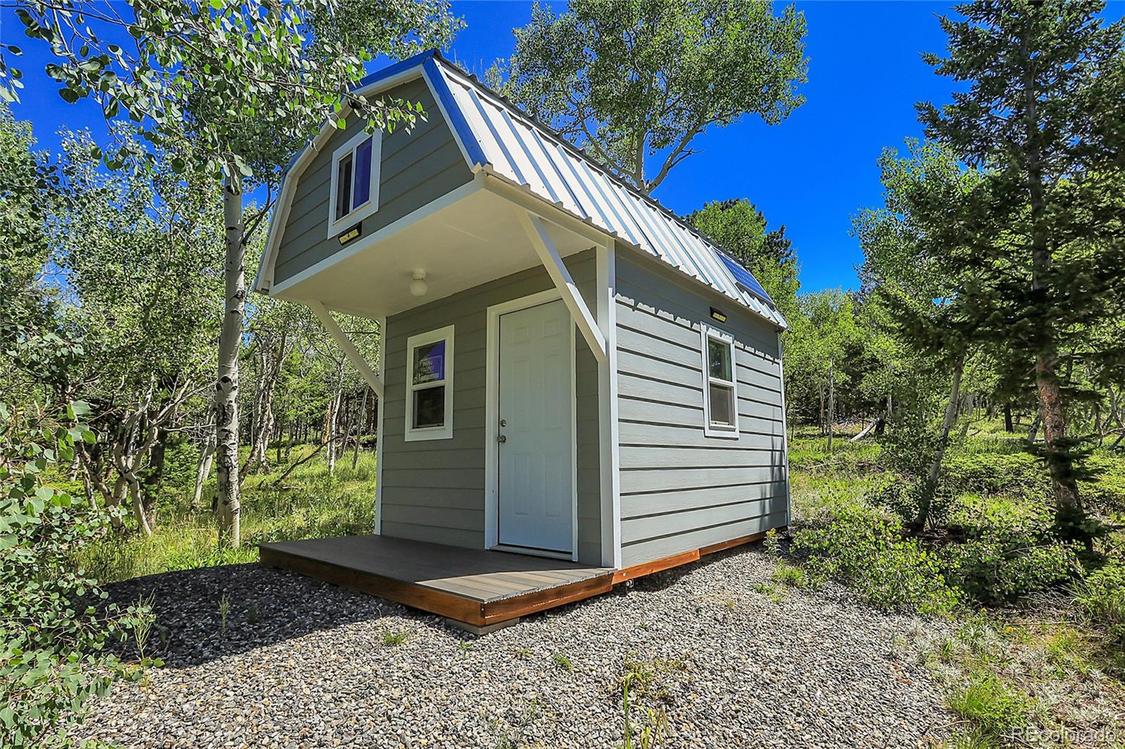 4 Hughesville Road Black Hawk, CO 80422 - Photo 17 of 29 a view of a house with a yard
