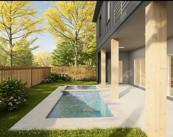 a view of a house with backyard