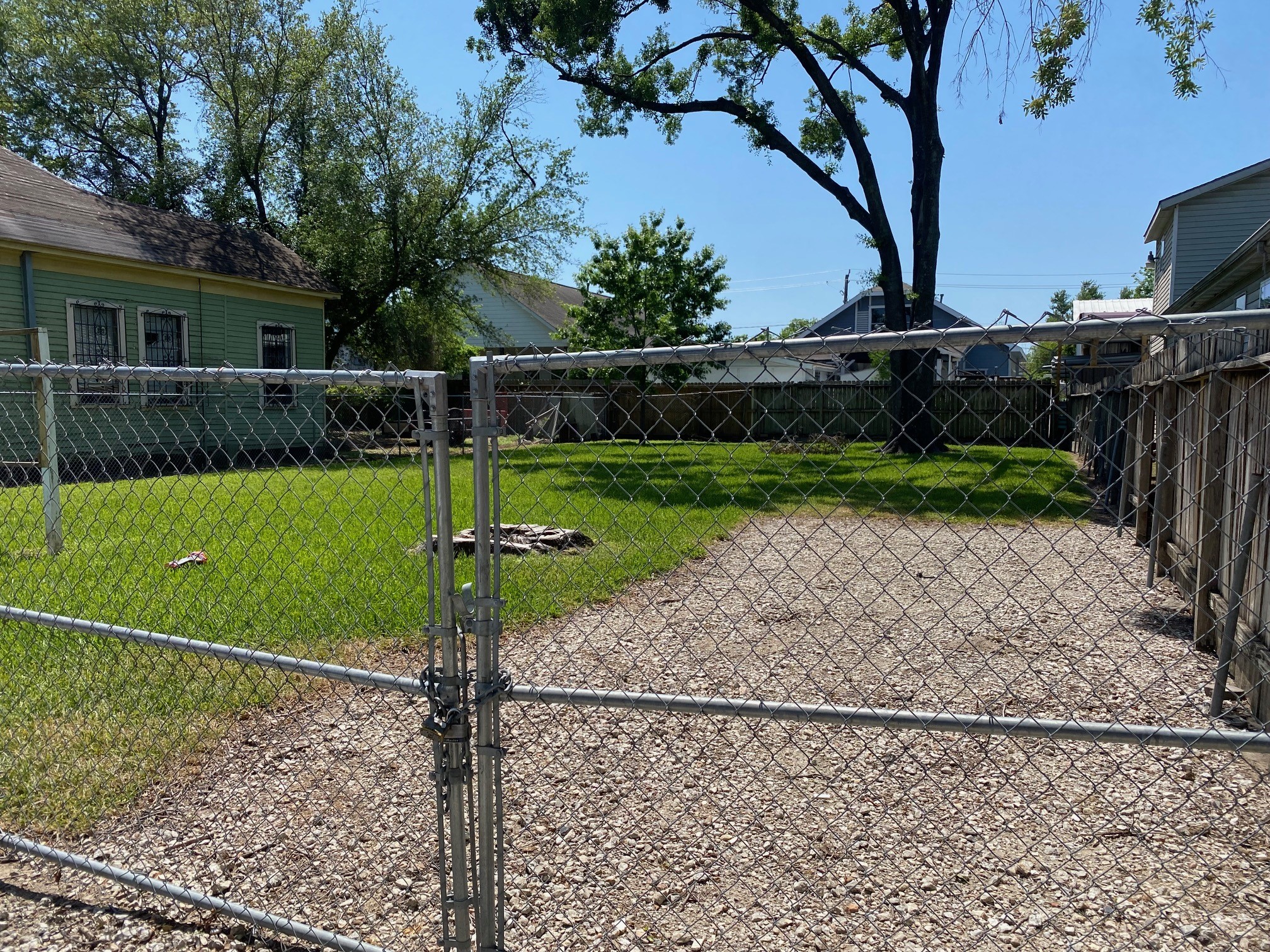 1911 Chestnut Street Houston, TX 77009 - Photo 4 of 9 a view of a house with backyard and a tree