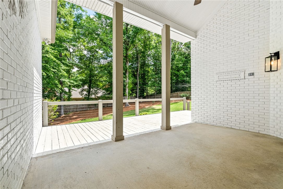 1657 Abby Road Auburn, AL 36830 - Photo 38 of 39 Enjoy outdoor living on this expansive porch, perfect for relaxation and entertaining.