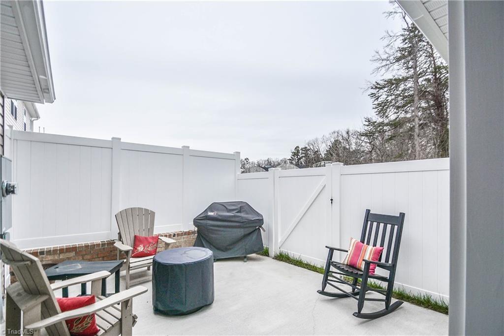 3512 Pebblestone Lane, Unit 142 High Point, NC 27265 - Photo 22 of 28 Outdoor patio area is fenced for privacy.