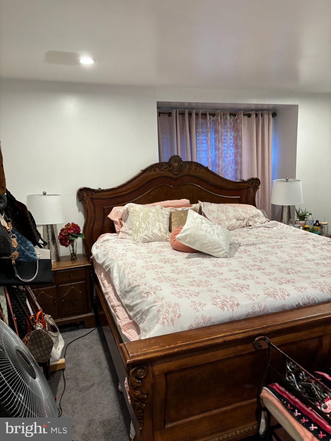 1513 Rainer Road Brookhaven, PA 19015 - Photo 12 of 21 a bedroom with a bed and dresser