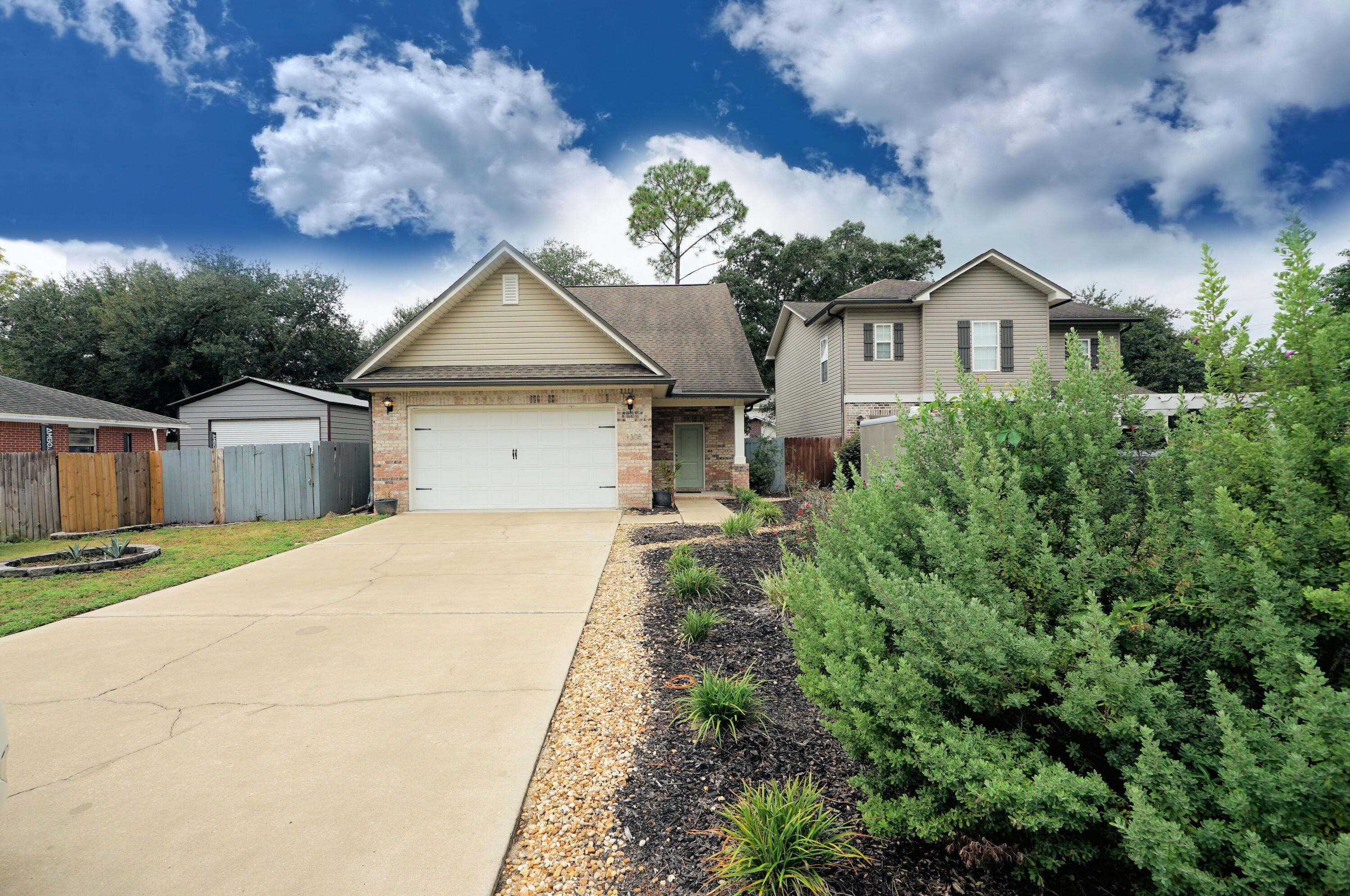 a house with trees in the background