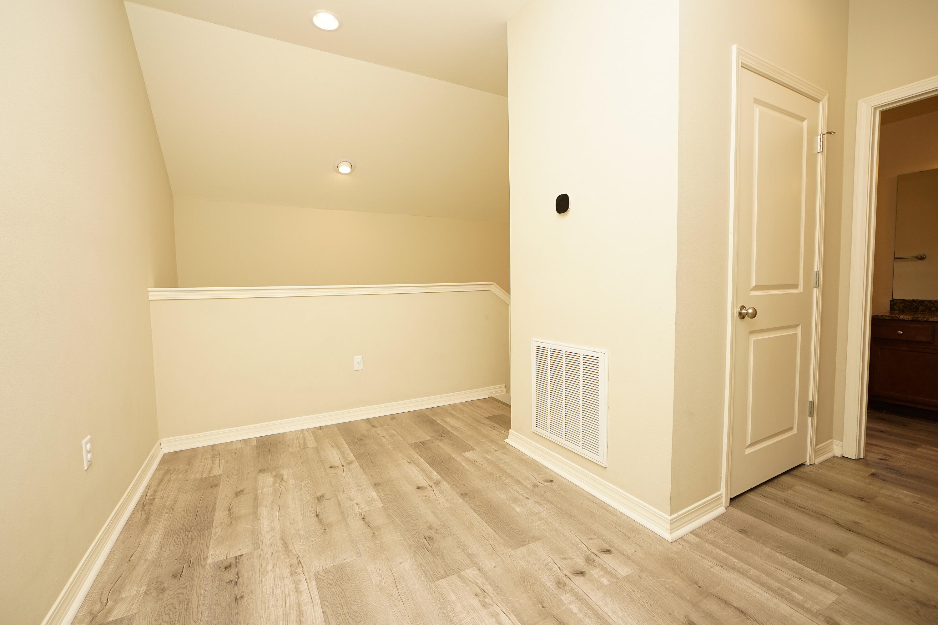 1305 Finck Road Niceville, FL 32578 - Photo 22 of 28 a view of a hallway with wooden floor