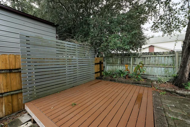 a view of a pathway with a backyard