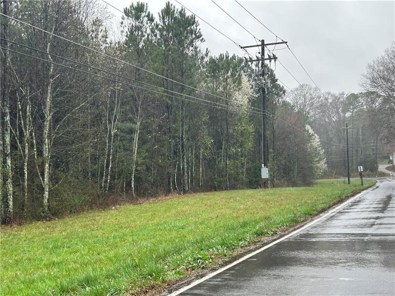 337 Mac Johnson Road Northwest Cartersville, GA 30121 - Photo 3 of 5 a view of a yard with a trees