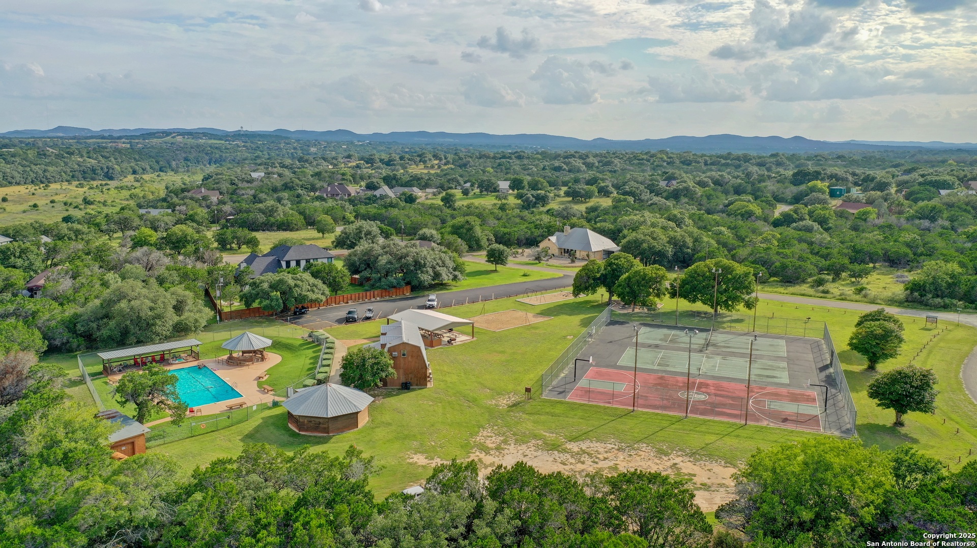 Lot 4 Heinen Bandera, TX 78003 - Photo 18 of 23 an aerial view of residential houses with outdoor space and trees