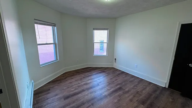 an empty room that has a window