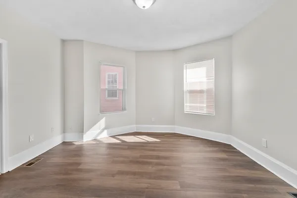 a bathroom with a sink mirror toilet and bathtub