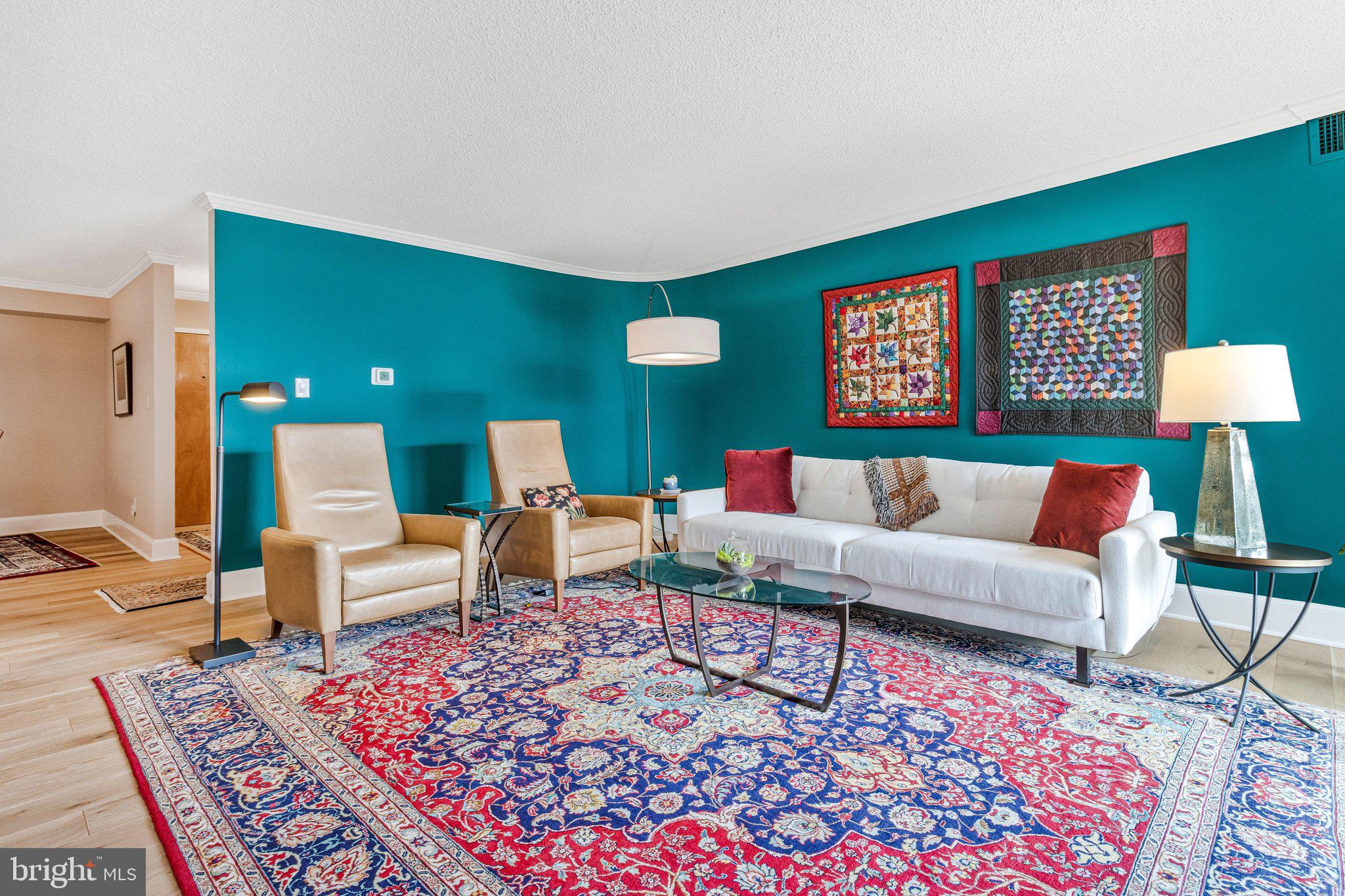 1101 South Arlington Ridge Road, Unit 706 Arlington, VA 22202 - Photo 12 of 59 a living room with furniture and wooden floor