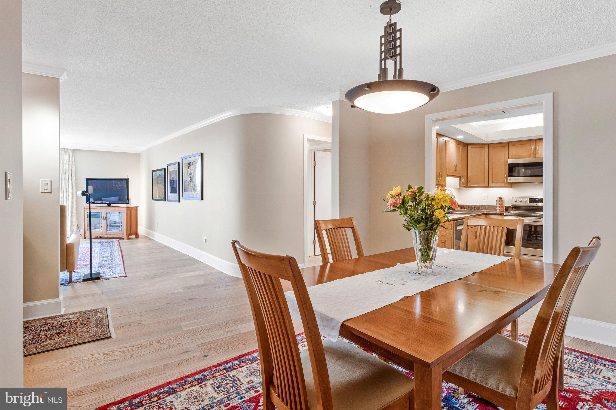 1101 South Arlington Ridge Road, Unit 706 Arlington, VA 22202 - Photo 13 of 59 a view of a dining room with furniture