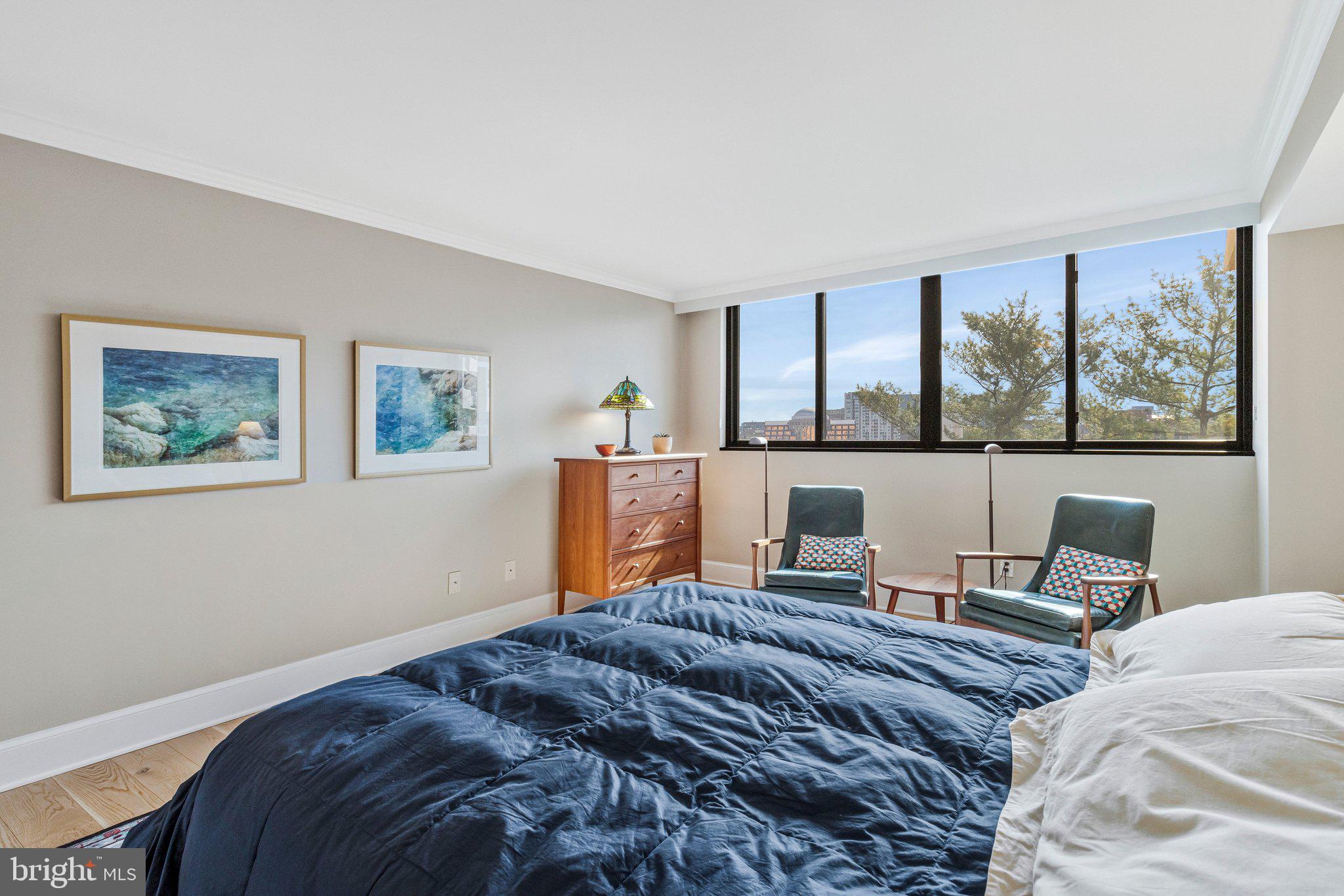 1101 South Arlington Ridge Road, Unit 706 Arlington, VA 22202 - Photo 18 of 59 a bedroom with a bed and a desk