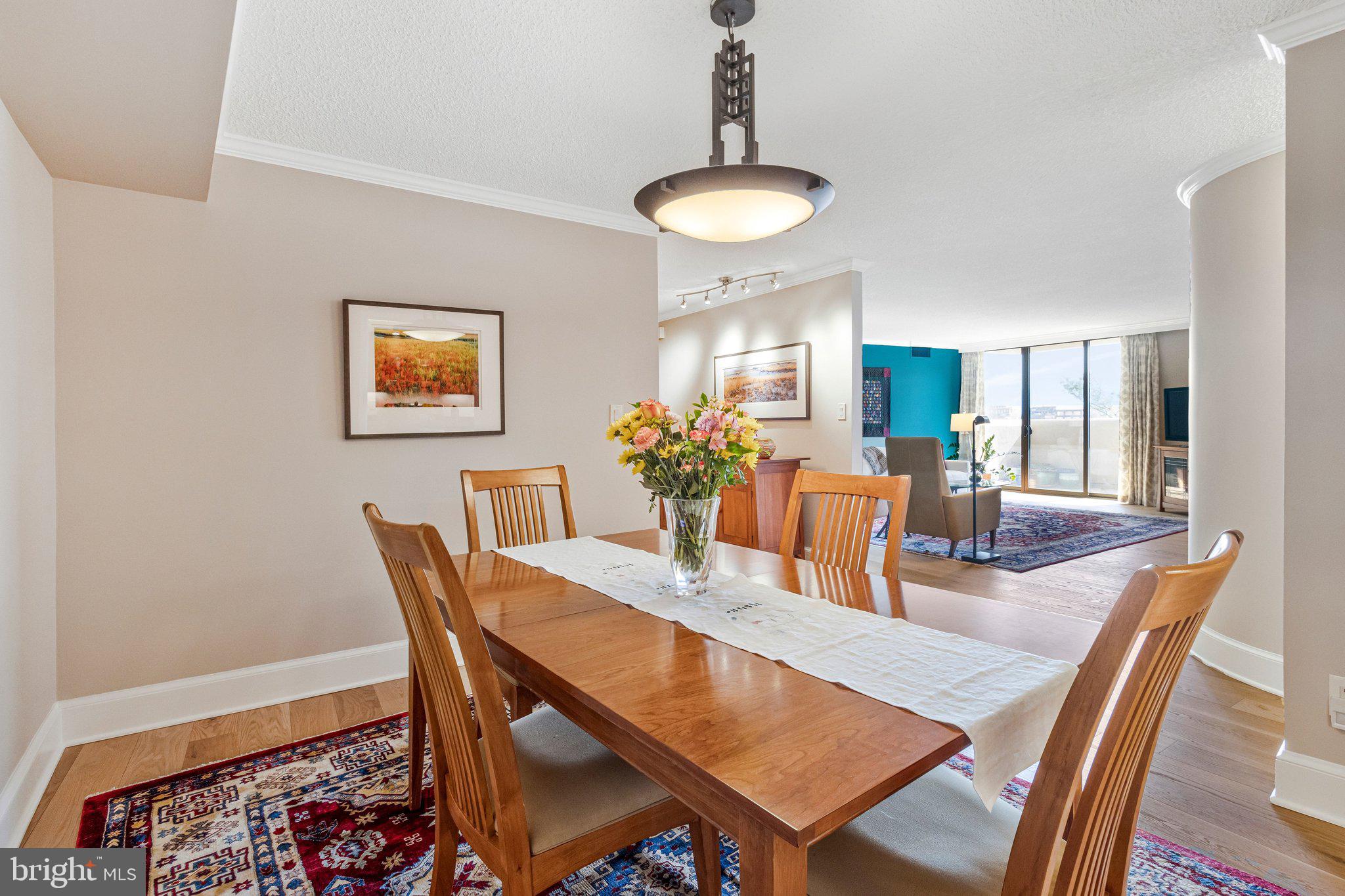 1101 South Arlington Ridge Road, Unit 706 Arlington, VA 22202 - Photo 20 of 59 a dining room with furniture and window