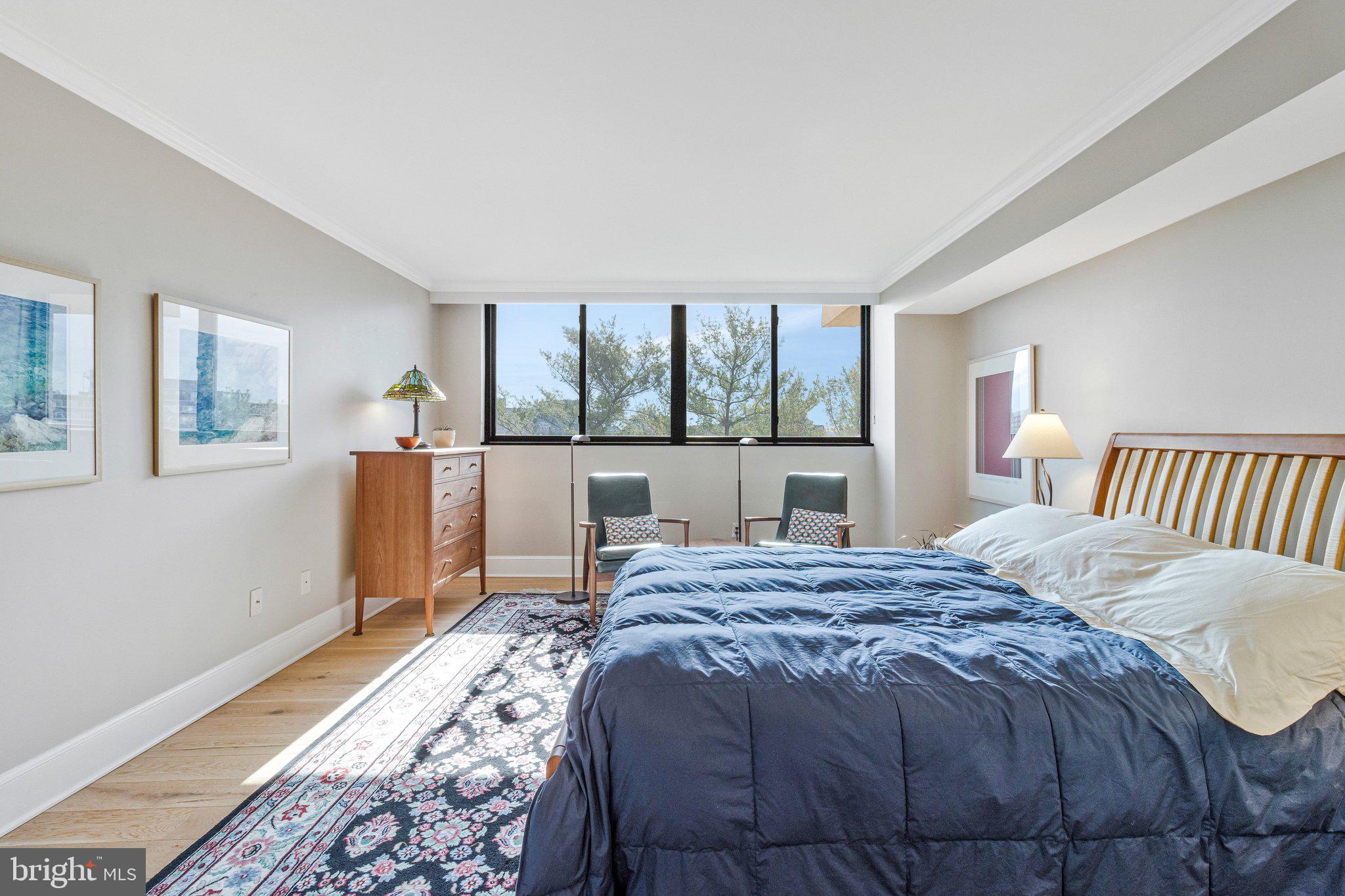 1101 South Arlington Ridge Road, Unit 706 Arlington, VA 22202 - Photo 25 of 59 a bedroom with a bed and a window