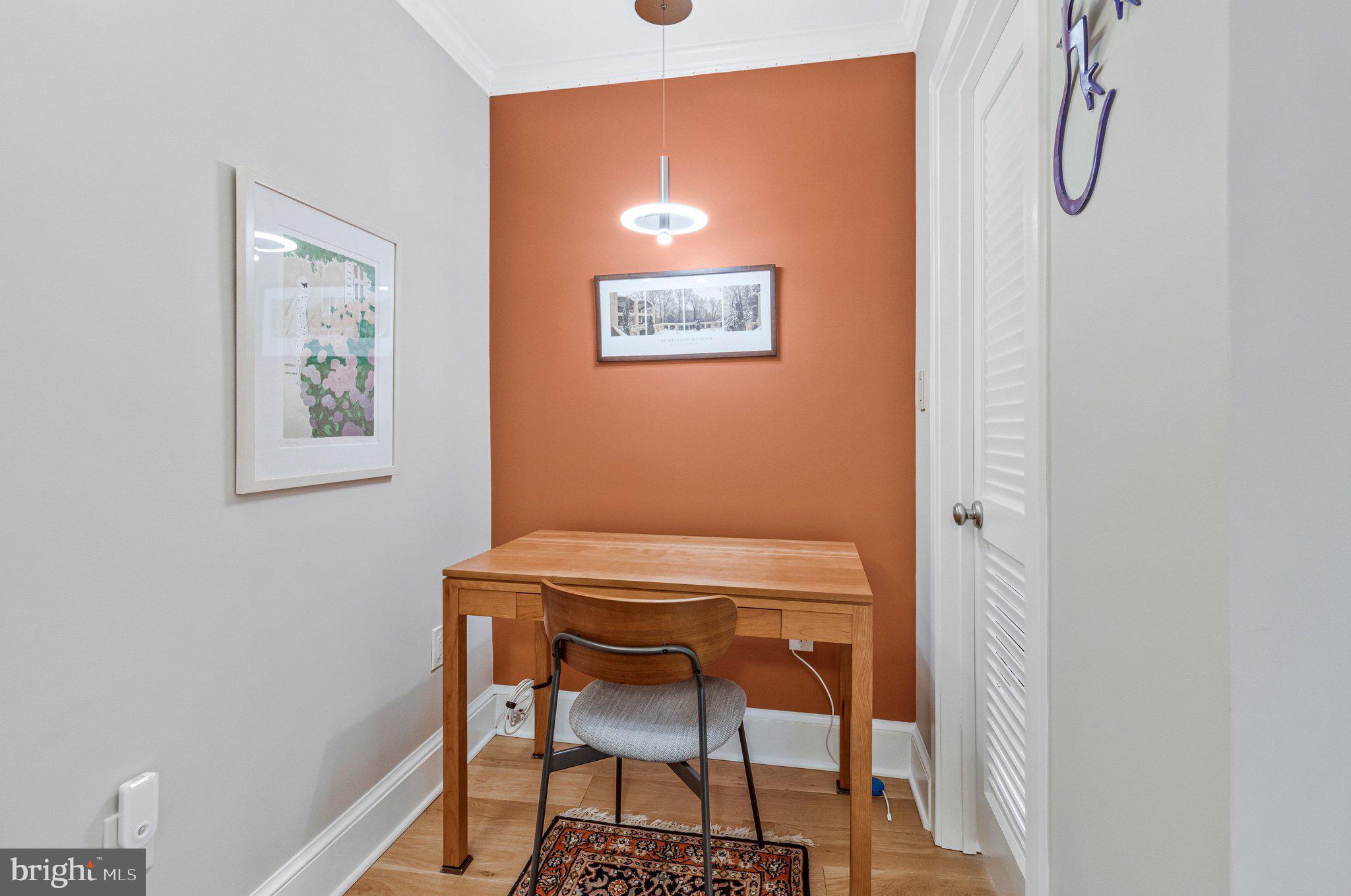 1101 South Arlington Ridge Road, Unit 706 Arlington, VA 22202 - Photo 28 of 59 a view of a dining room with furniture and a chandelier