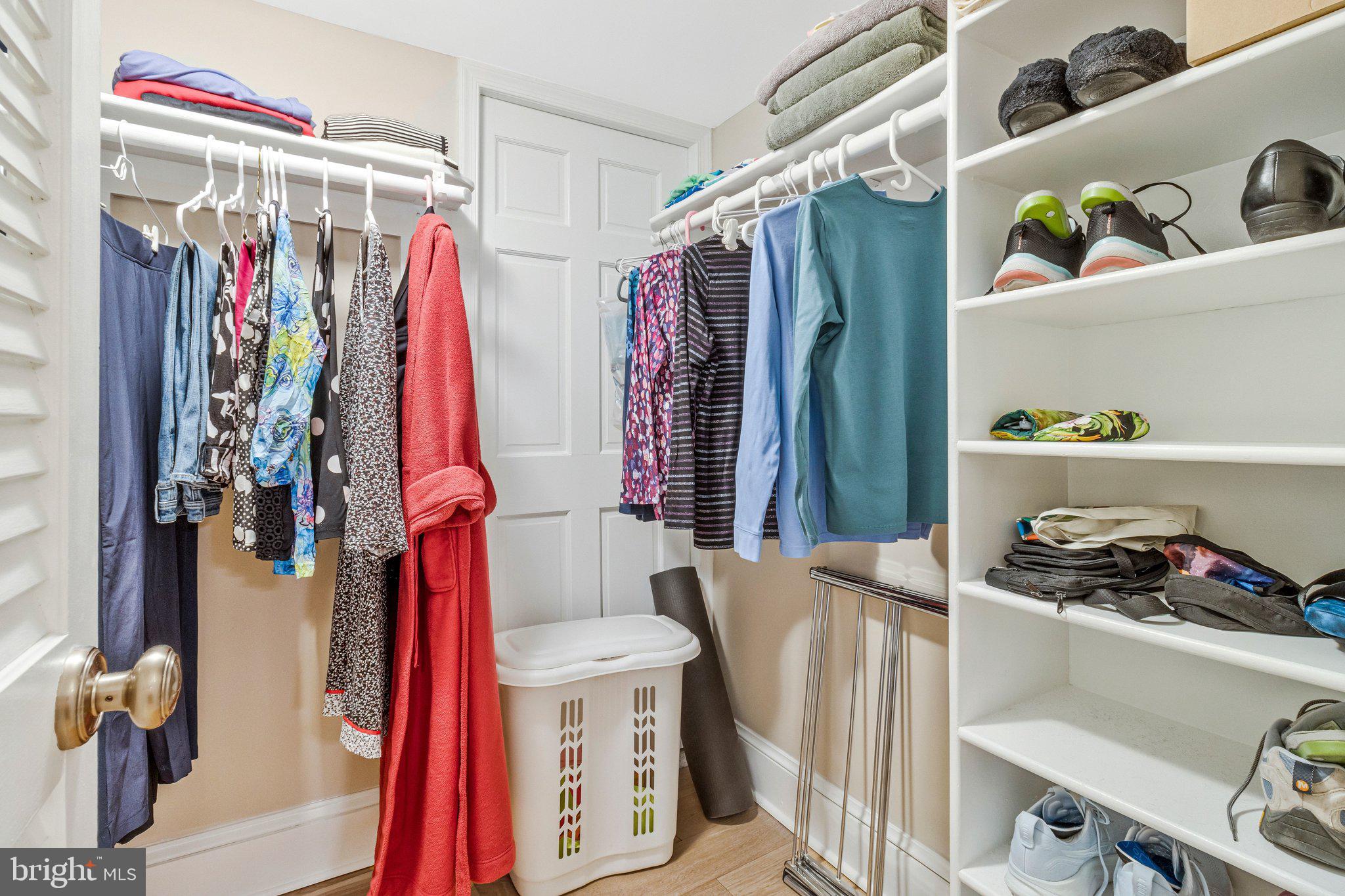 1101 South Arlington Ridge Road, Unit 706 Arlington, VA 22202 - Photo 30 of 59 a view of walk in closet with clothes and shoes