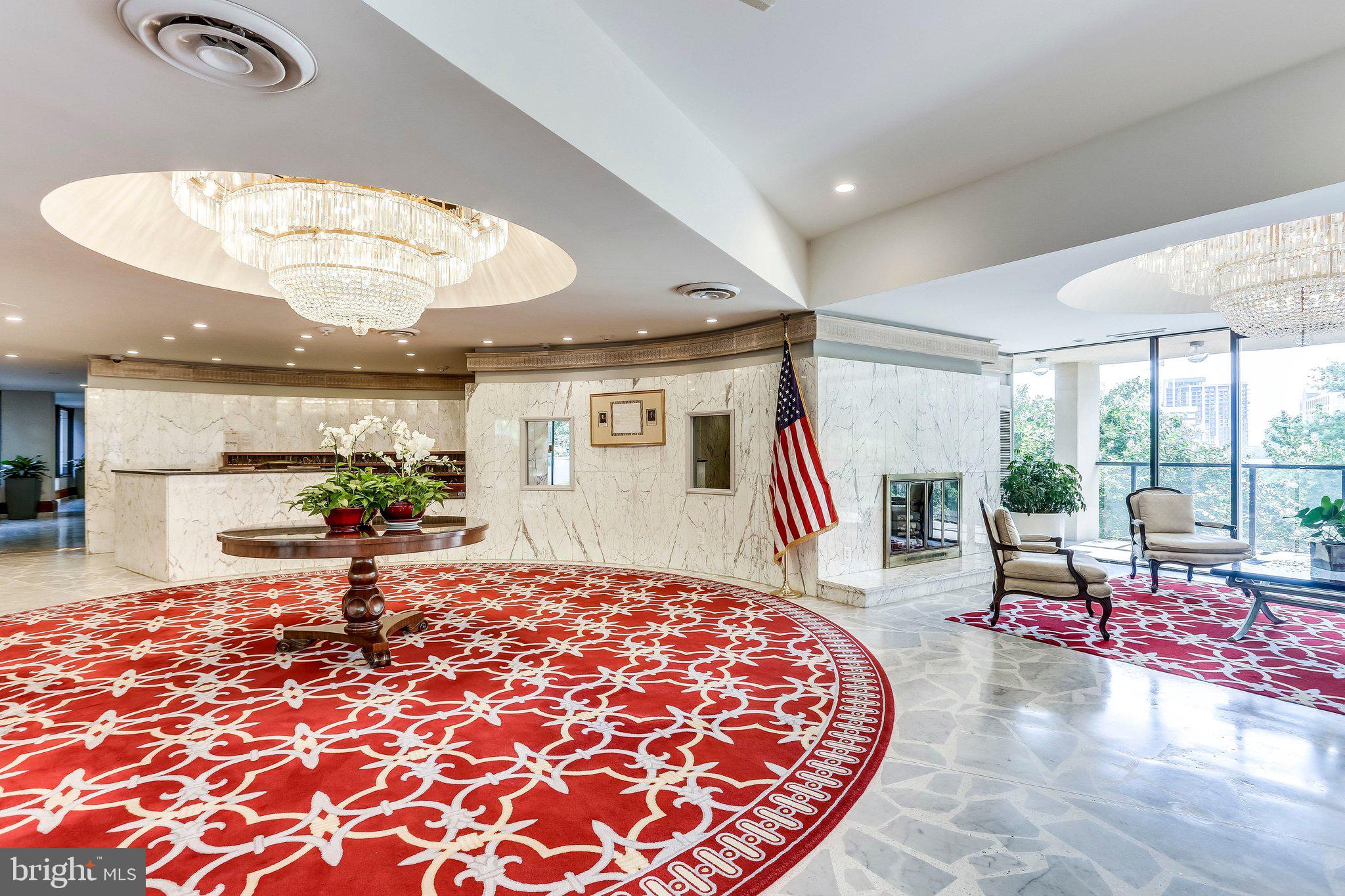 1101 South Arlington Ridge Road, Unit 706 Arlington, VA 22202 - Photo 3 of 59 a living room filled with furniture and a large window