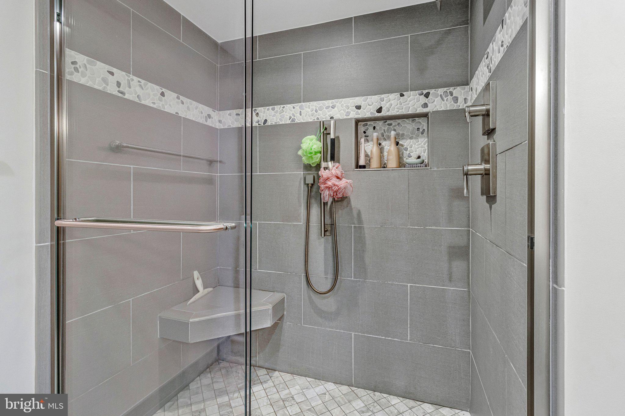 1101 South Arlington Ridge Road, Unit 706 Arlington, VA 22202 - Photo 34 of 59 a bathroom with a shower