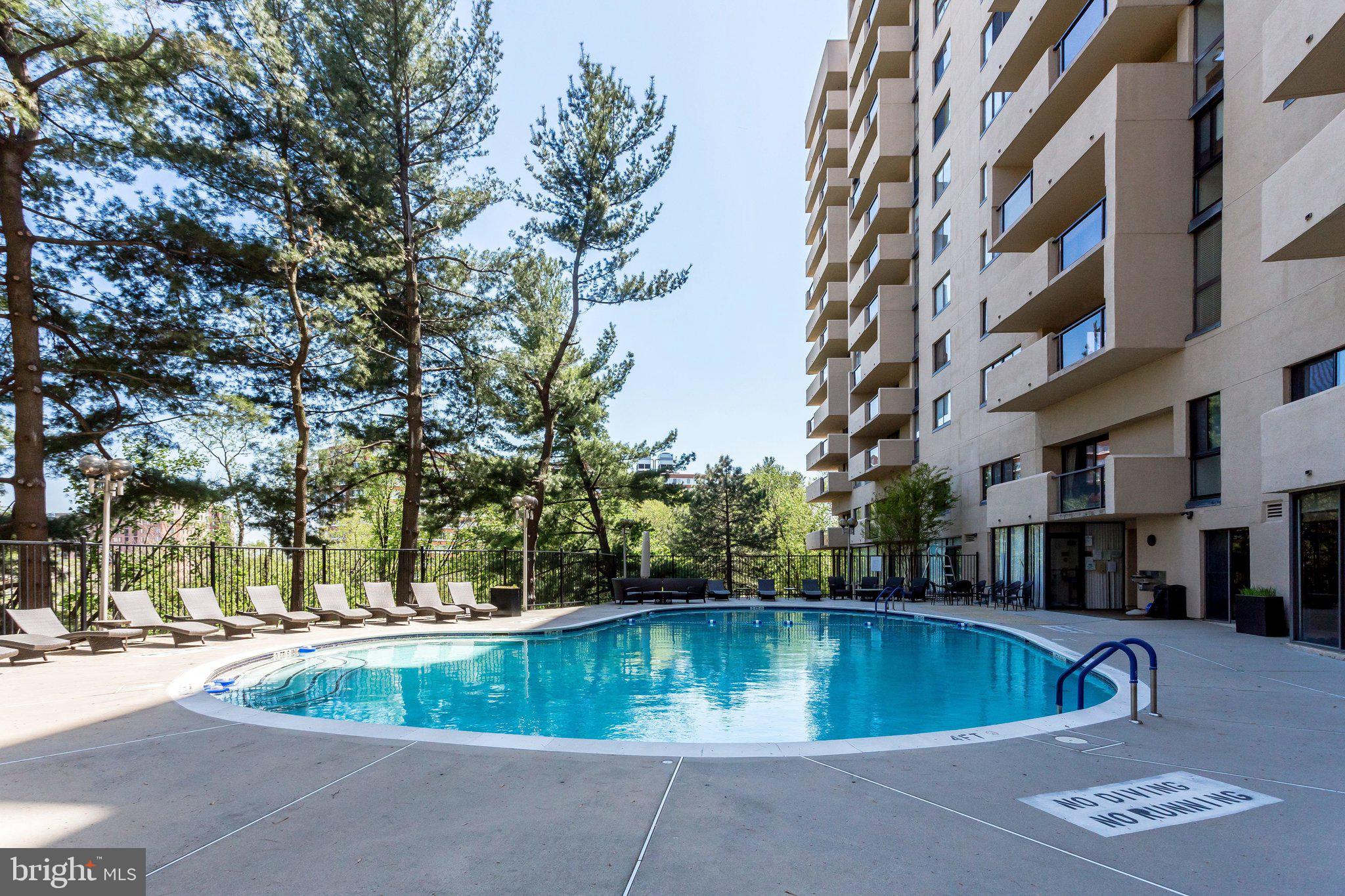 1101 South Arlington Ridge Road, Unit 706 Arlington, VA 22202 - Photo 51 of 59 a view of outdoor space yard swimming pool and sitting area