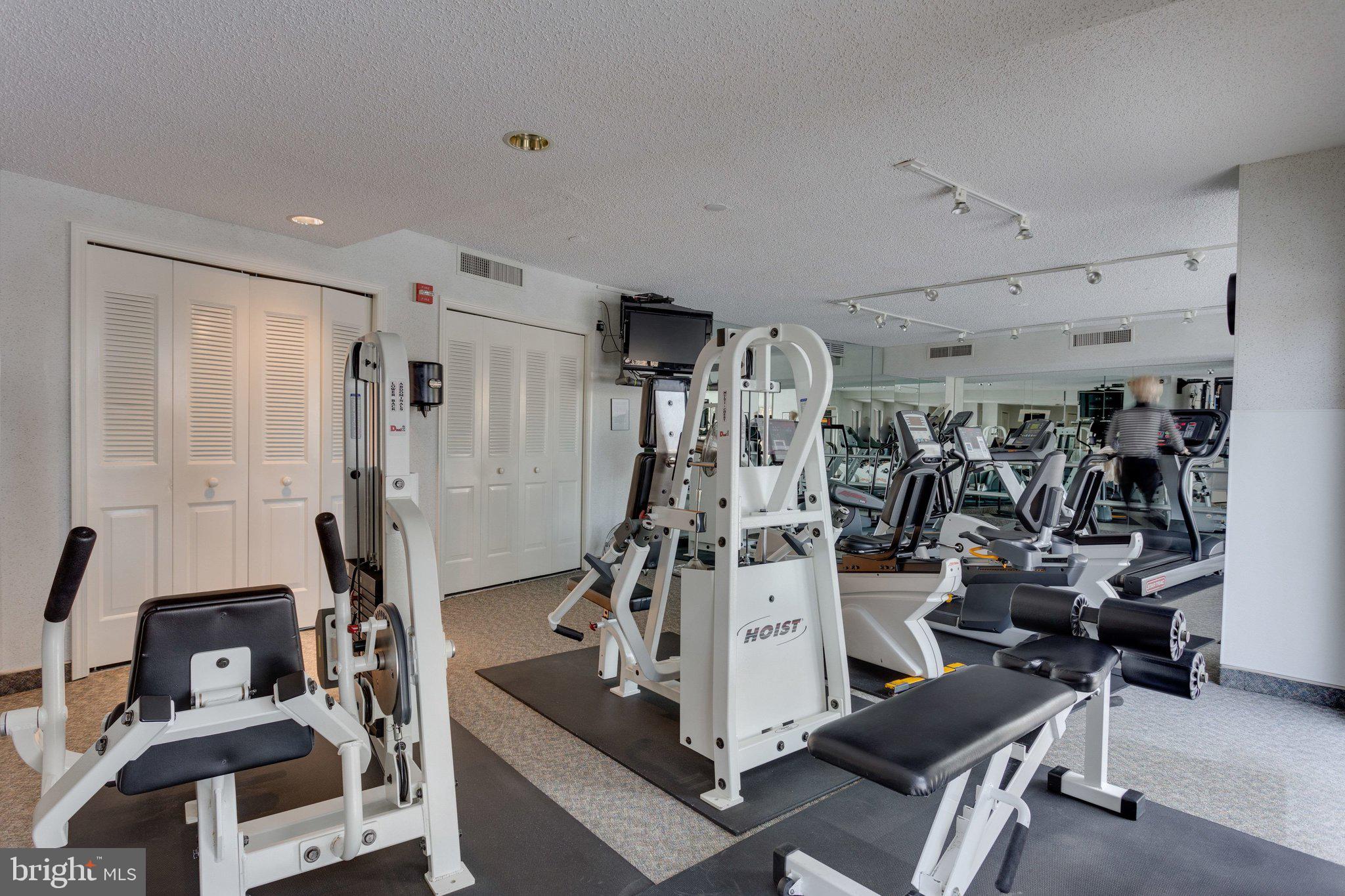 1101 South Arlington Ridge Road, Unit 706 Arlington, VA 22202 - Photo 55 of 59 a view of a room with gym equipment