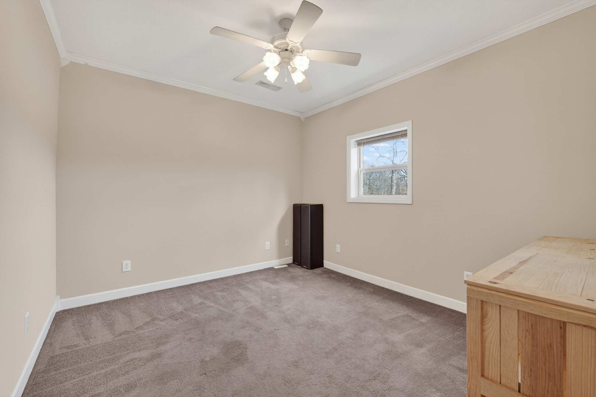 31 Frame Lane Kelso, TN 37348 - Photo 16 of 27 an empty room with windows and fan