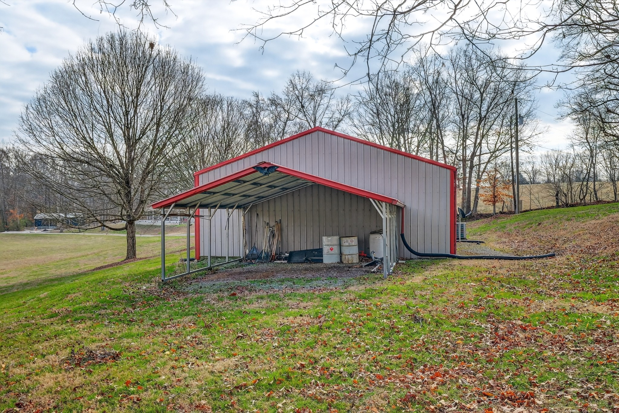 31 Frame Lane Kelso, TN 37348 - Photo 26 of 27 a house that has a tree in front of it