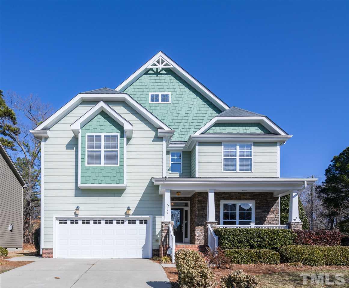 5741 Spring Glen Lane Raleigh, NC 27616 - Photo 1 of 25 a front view of a house with a yard