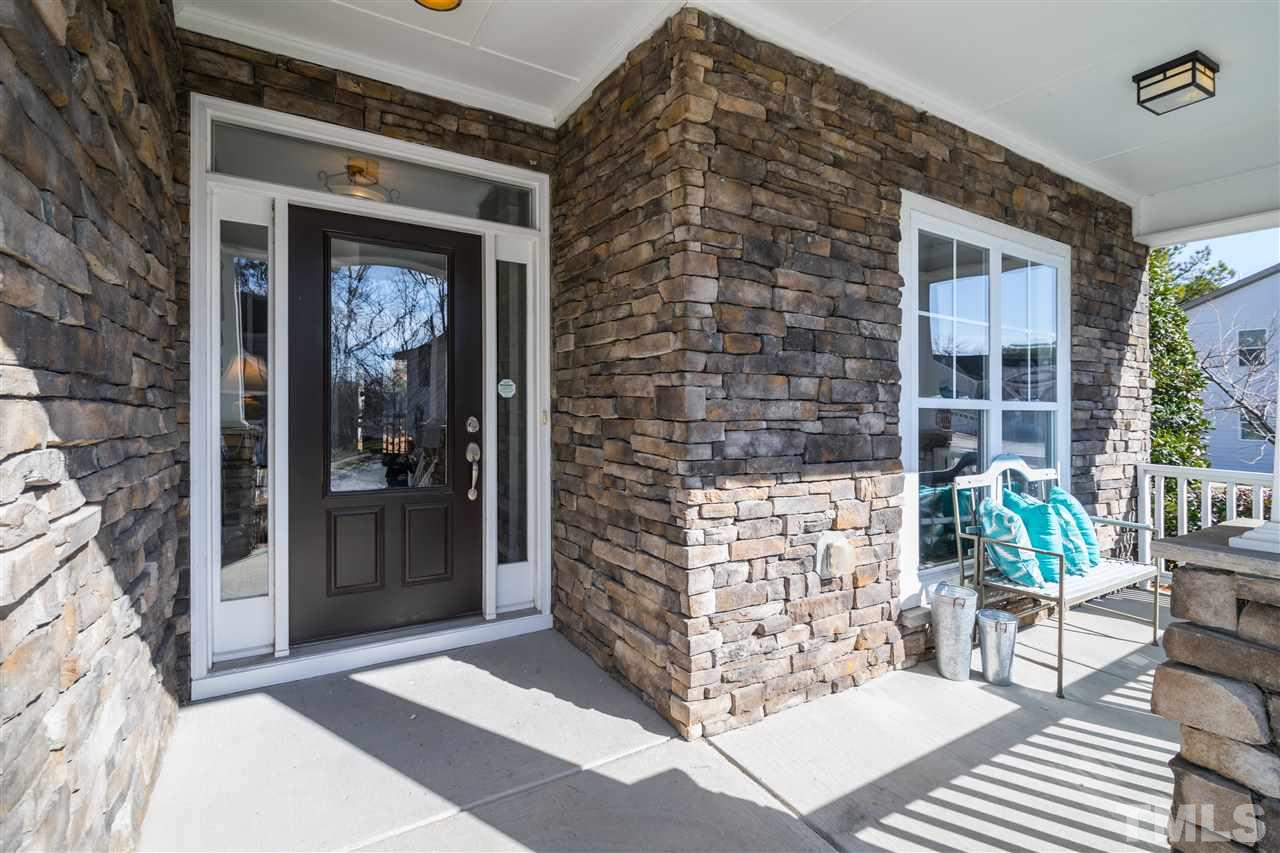 5741 Spring Glen Lane Raleigh, NC 27616 - Photo 2 of 25 a front view of a house with outdoor seating