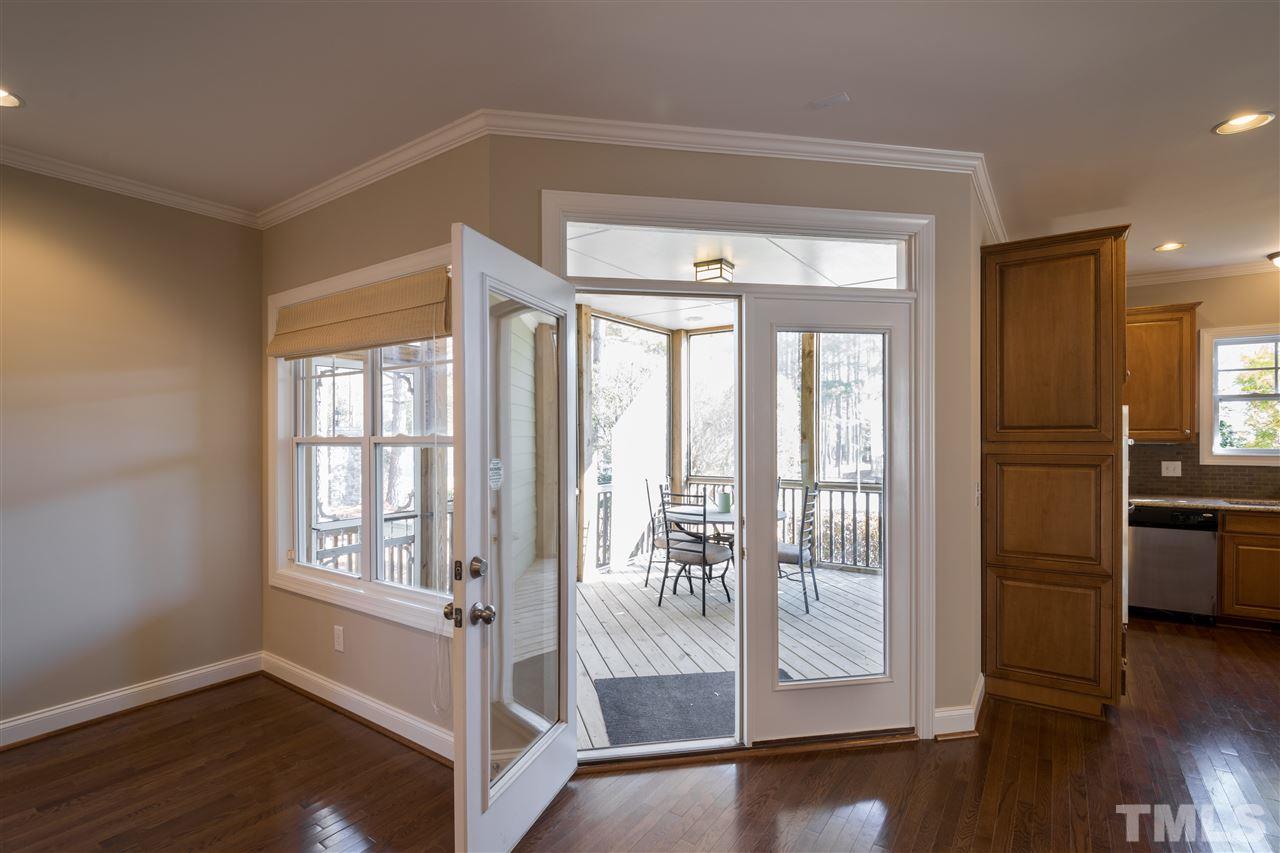 5741 Spring Glen Lane Raleigh, NC 27616 - Photo 11 of 25 a view of entryway with wooden floor