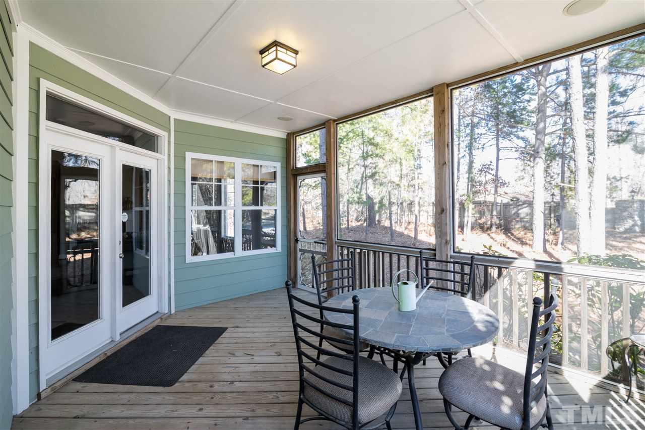 5741 Spring Glen Lane Raleigh, NC 27616 - Photo 12 of 25 a view of a room with furniture window and wooden floor