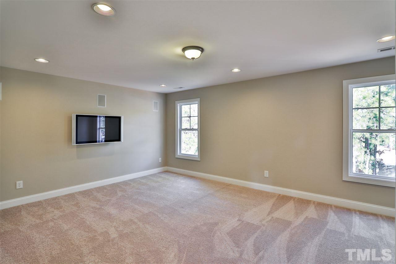 5741 Spring Glen Lane Raleigh, NC 27616 - Photo 19 of 25 an empty room with windows and closet
