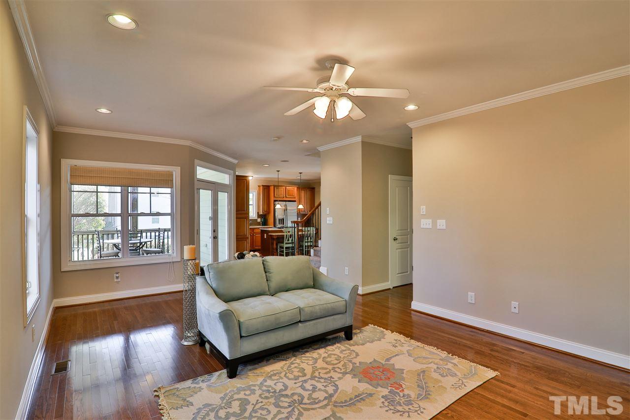 5741 Spring Glen Lane Raleigh, NC 27616 - Photo 8 of 25 a living room with furniture and wooden floor