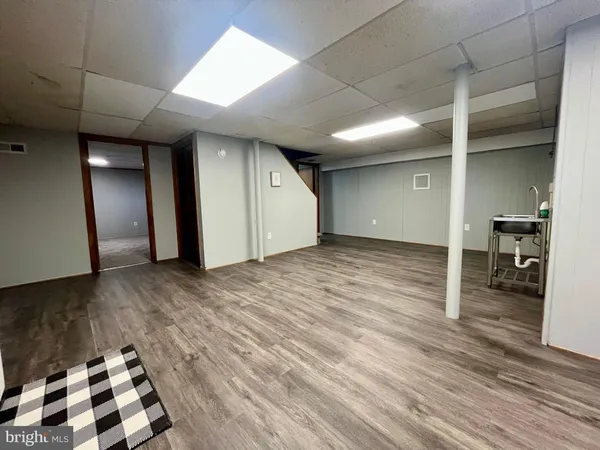 a view of a livingroom with wooden floor
