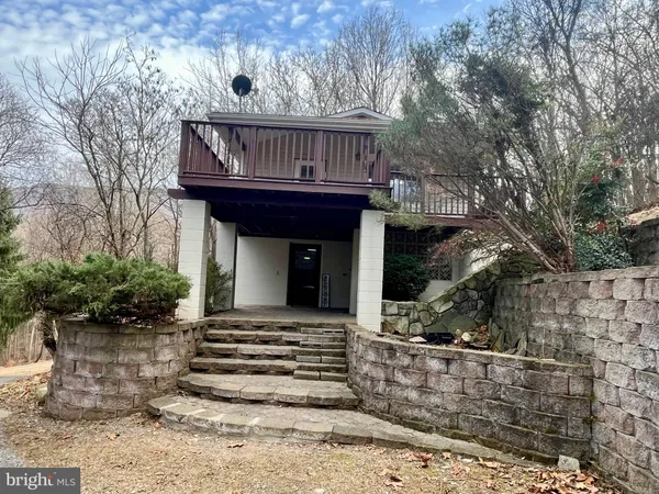 a view of house with outdoor space