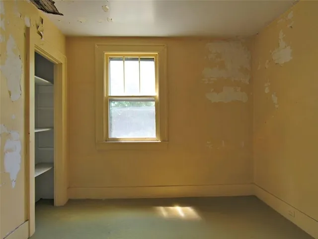 an empty room with a window