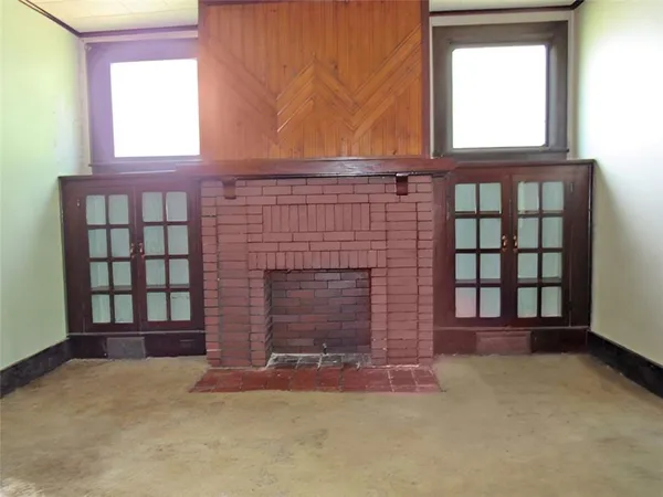 a front view of a house with a garage