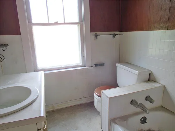 a bathroom with a sink and a toilet
