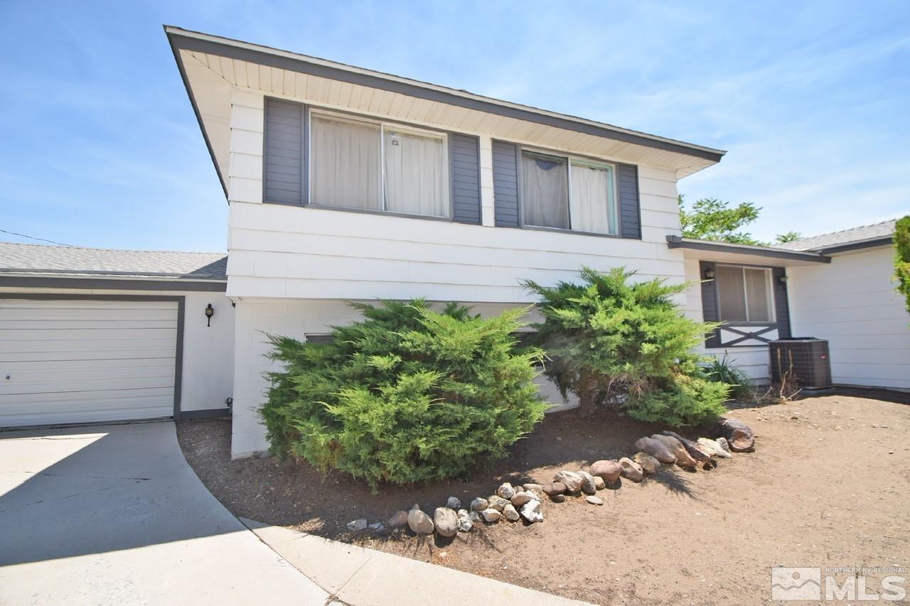 3145 Heights Reno, NV 89503 - Photo 18 of 24 a front view of a house with a yard