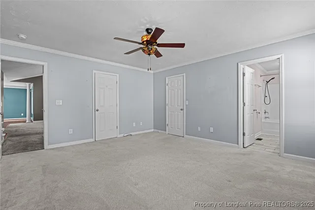 a view of a livingroom with a ceiling fan