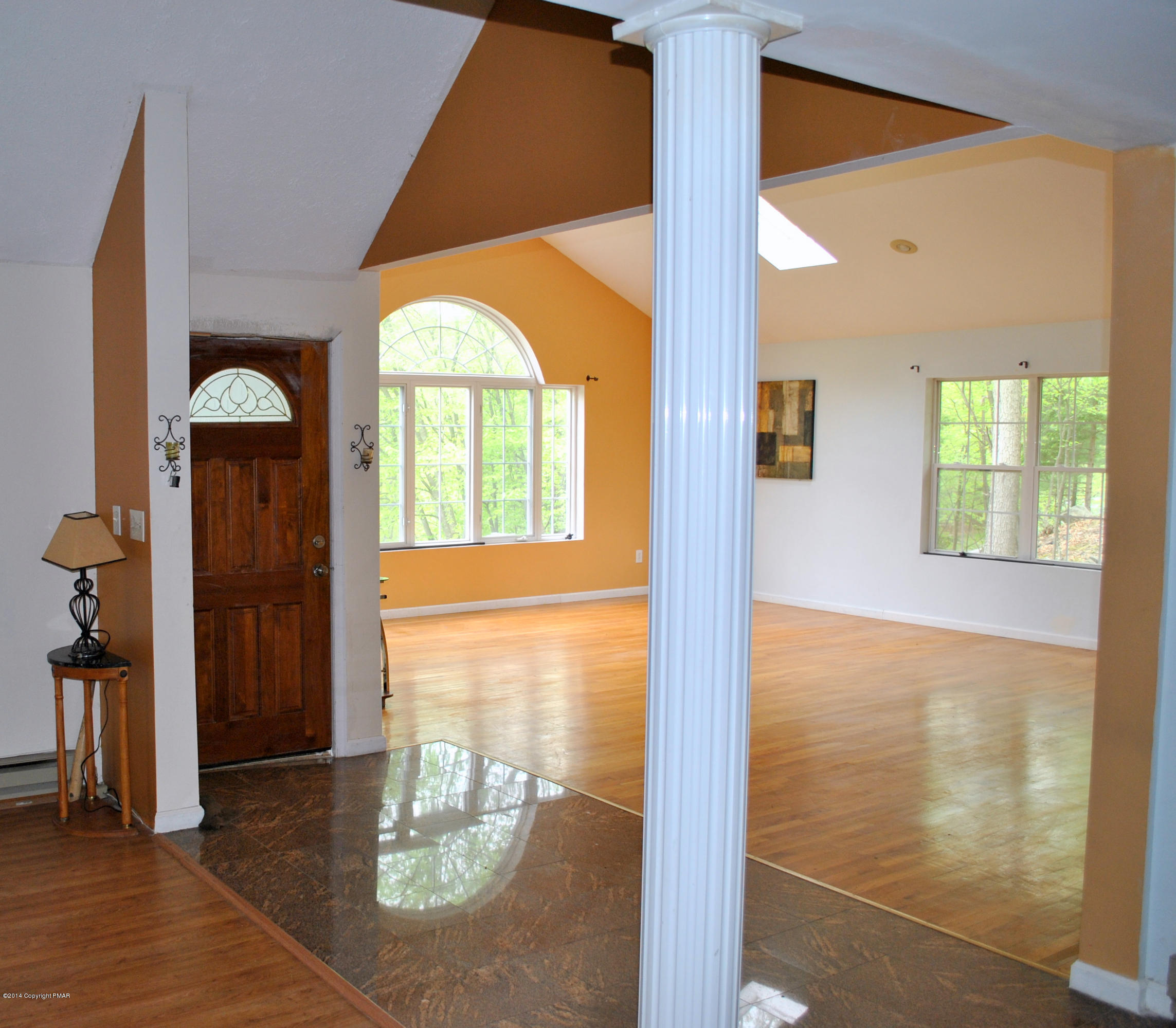6165 Decker Road Bushkill, PA 18324 - Photo 3 of 16 a view of a hallway with furniture and windows