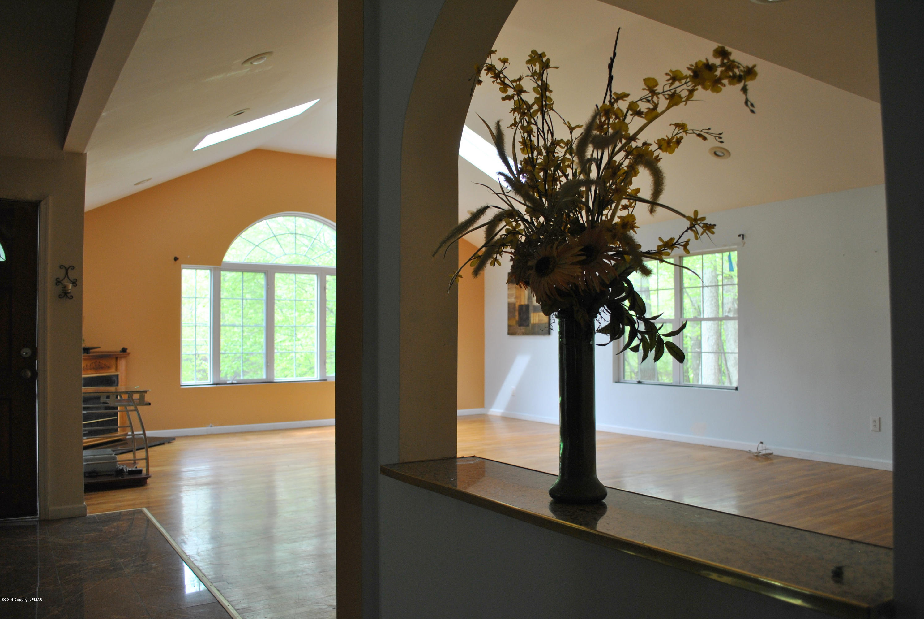 6165 Decker Road Bushkill, PA 18324 - Photo 4 of 16 a view of a porch with a vase of flowers