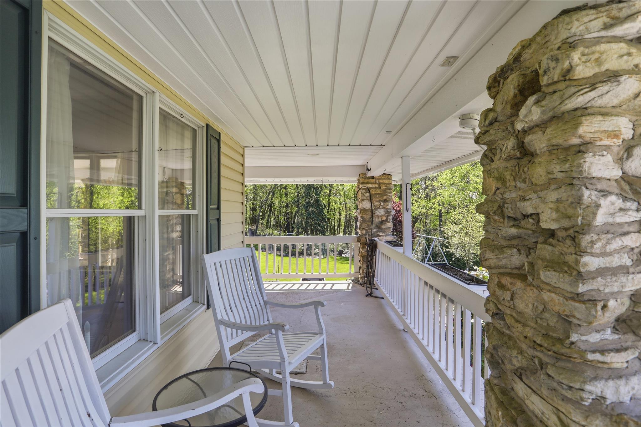 216 Aughwick Road McConnellsburg, PA 17233 - Photo 6 of 53 Covered front porch to enjoy the outdoors