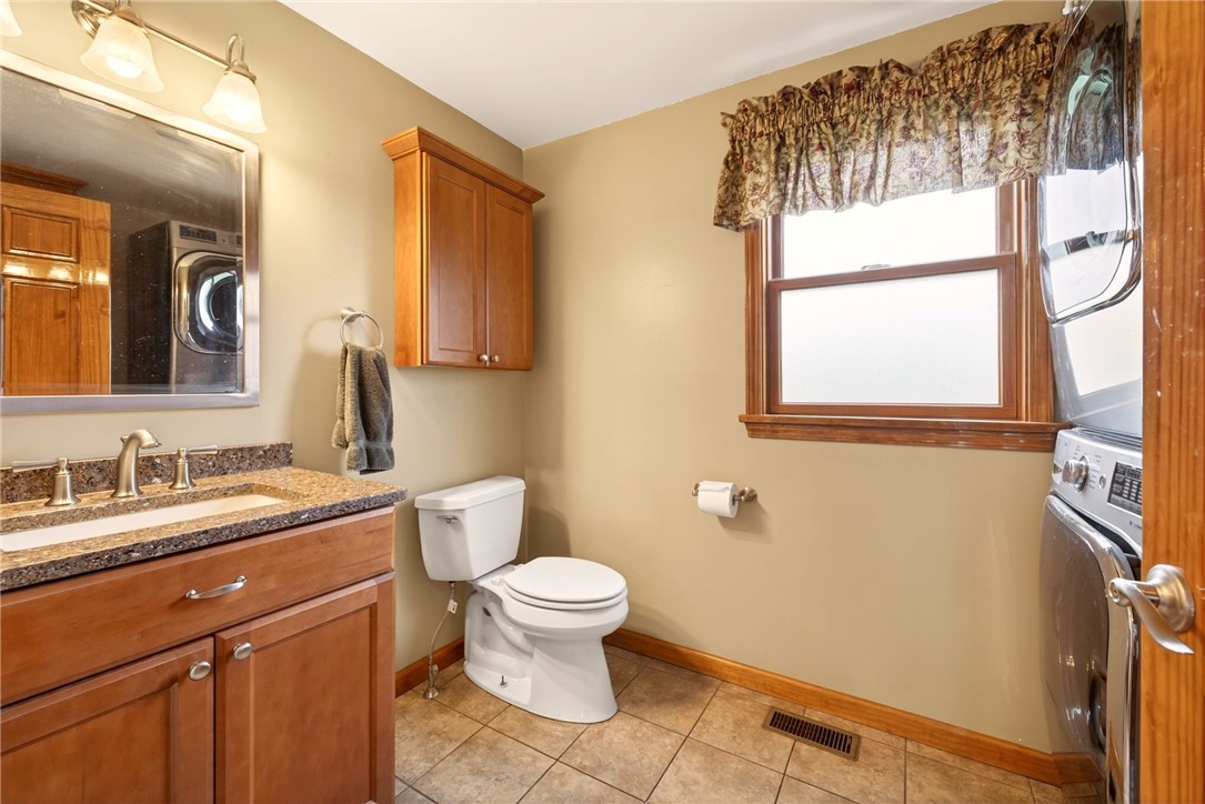 5951 Holmes Hill Road Livonia, NY 14435 - Photo 16 of 35 First floor laundry & half bath